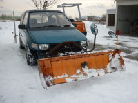 今日は除雪車・ミニユンボを運んでいました。