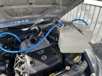 突然冷却水が逆流し噴き出した 日産Z33のヒーターコア詰まり清掃修理